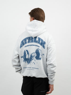 Mann von hinten im hellgrauen Hoodie mit blauem Athlix-Performance-Print und Hantel-Grafik